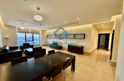 Living / Dining Room image for: Apartment - 2 Bedrooms - 3 Bathrooms for rent in West Bay Tower - West Bay - West Bay - Doha, Image 1
