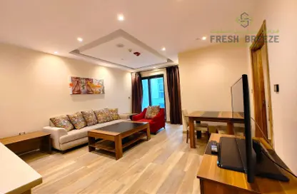 Living Room image for: Apartment - 1 Bedroom - 2 Bathrooms for rent in Al Sadd - Al Sadd - Doha, Image 1