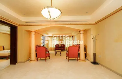 Living Room image for: Penthouse - 2 Bedrooms - 3 Bathrooms for sale in West Porto Drive - Porto Arabia - The Pearl Island - Doha, Image 1