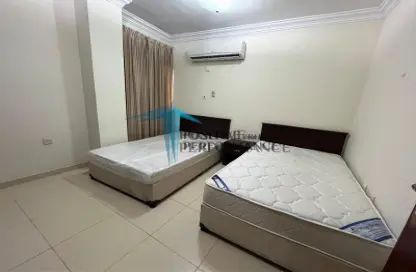 Apartment - 2 Bedrooms - 2 Bathrooms for rent in Al Mansoura - Al Mansoura - Doha