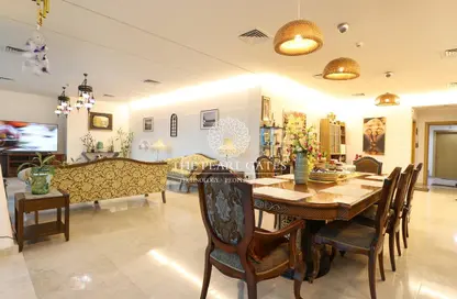 Living / Dining Room image for: Apartment - 3 Bedrooms - 5 Bathrooms for sale in Zig Zag Towers - West Bay - Doha, Image 1