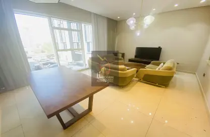 Living / Dining Room image for: Apartment - 2 Bedrooms - 4 Bathrooms for rent in Al Sadd Road - Al Sadd - Doha, Image 1
