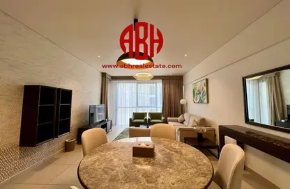 Living / Dining Room image for: Apartment - 1 Bedroom - 2 Bathrooms for rent in Al Jassim Tower - C-Ring Road - Al Sadd - Doha, Image 1