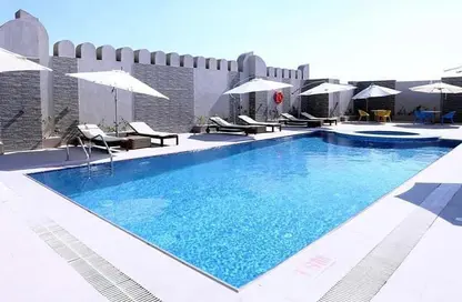 Pool image for: Apartment - 1 Bathroom for rent in Al Aqaria Tower - Old Salata - Salata - Doha, Image 1