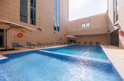 Pool image for: Apartment - 1 Bedroom - 2 Bathrooms for rent in Bin Al Sheikh Towers - Al Mirqab Al Jadeed - Doha, Image 1