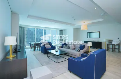 Living Room image for: Apartment - 2 Bedrooms - 3 Bathrooms for sale in West Bay Tower - West Bay - West Bay - Doha, Image 1