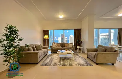 صورة لـ غرفة المعيشة شقة - 2 غرف نوم - 3 حمامات للايجار في برج أعمال - الحي التجاري - الخليج الغربي - الدوحة ، صورة رقم 1