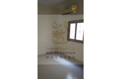 Empty Room image for: Apartment - 2 Bedrooms - 2 Bathrooms for rent in Ain Khaled - Ain Khaled - Doha, Image 1