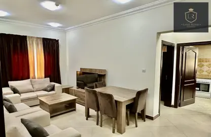 Living / Dining Room image for: Apartment - 1 Bedroom - 1 Bathroom for rent in Umm Ghwailina Comm - Umm Ghuwalina - Umm Ghuwailina - Doha, Image 1