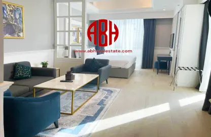 Living Room image for: Apartment - 1 Bathroom for sale in Al Sadd Road - Al Sadd - Doha, Image 1