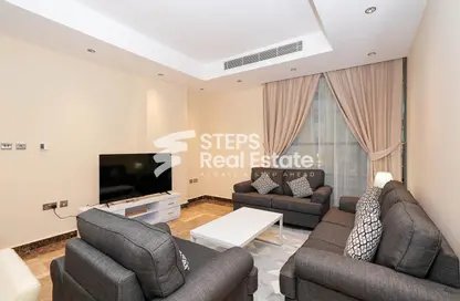 Living Room image for: Apartment - 2 Bedrooms - 2 Bathrooms for rent in Giardino Village - The Pearl Island - Doha, Image 1