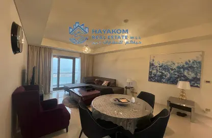 Living / Dining Room image for: Apartment - 2 Bedrooms - 2 Bathrooms for rent in Burj DAMAC Marina - Lusail, Image 1
