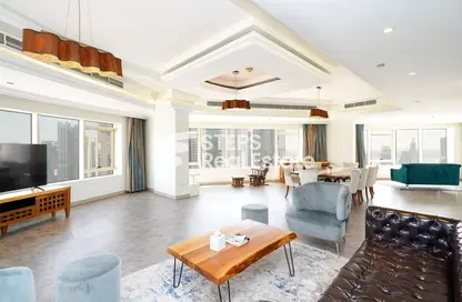 Living / Dining Room image for: Penthouse - 4 Bedrooms - 5 Bathrooms for rent in Al Shatt Street - West Bay - Doha, Image 1