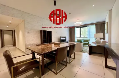 Living / Dining Room image for: Apartment - 2 Bedrooms - 3 Bathrooms for rent in Al Jassim Tower - C-Ring Road - Al Sadd - Doha, Image 1