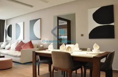 Living / Dining Room image for: Apartment - 1 Bedroom - 2 Bathrooms for rent in Qatar Entertainment City - Lusail, Image 1