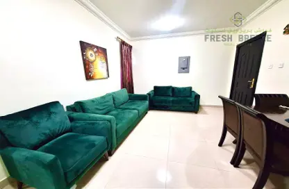 Living Room image for: Apartment - 1 Bedroom - 2 Bathrooms for rent in Umm Ghuwailina - Doha, Image 1