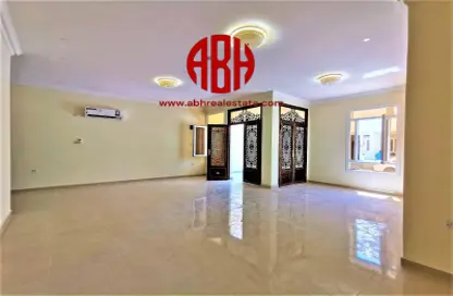 Empty Room image for: Villa - 4 Bedrooms - 4 Bathrooms for rent in Umm Al Seneem Street - Ain Khaled - Doha, Image 1