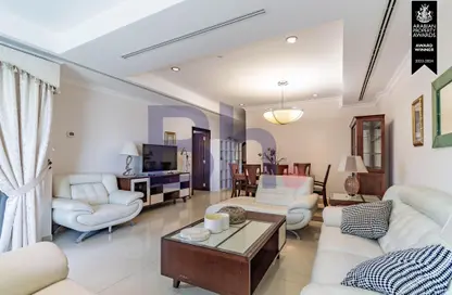Living / Dining Room image for: Apartment - 2 Bedrooms - 3 Bathrooms for rent in Porto Arabia Townhouses - Porto Arabia - The Pearl Island - Doha, Image 1