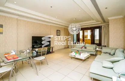 Living / Dining Room image for: Apartment - 1 Bedroom - 2 Bathrooms for sale in West Porto Drive - Porto Arabia - The Pearl Island - Doha, Image 1
