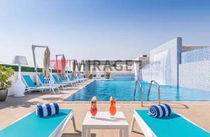 صورة لـ حوض سباحة شقة - غرفة نوم - 2 حمامات للايجار في شارع السد - السد - الدوحة ، صورة رقم 1