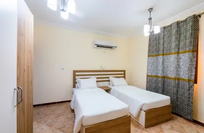 صورة لـ غرفة- غرفة النوم شقة - 4 غرف نوم - 3 حمامات للايجار في مشيرب - مشيرب - الدوحة ، صورة رقم 1