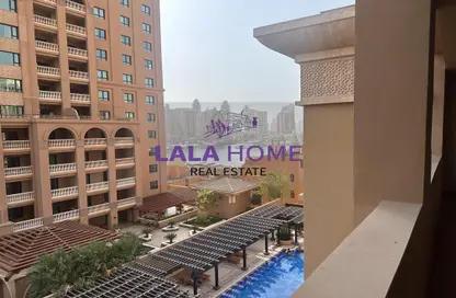 Outdoor Building image for: Apartment - 1 Bedroom - 2 Bathrooms for rent in Piazza Arabia - Porto Arabia - The Pearl Island - Doha, Image 1