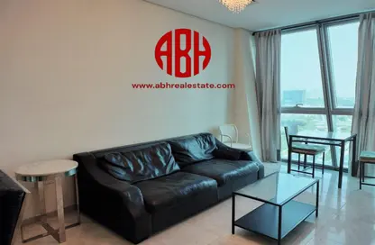 Living Room image for: Apartment - 2 Bedrooms - 3 Bathrooms for rent in Zig Zag Tower B - Zig Zag Towers - West Bay - Doha, Image 1