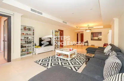 صورة لـ غرفة المعيشة شقة - غرفة نوم - 2 حمامات للبيع في طريق بورتو الغربي - بورتو أرابيا - جزيرة اللؤلؤة - الدوحة ، صورة رقم 1