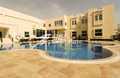 Pool image for: Villa - 5 Bedrooms - 5 Bathrooms for rent in Bu Hamour Street - Abu Hamour - Doha, Image 1