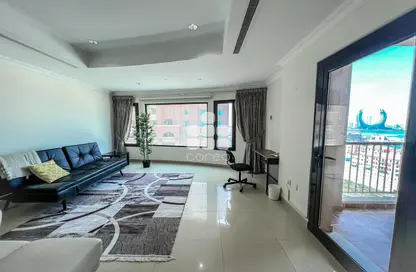 Living Room image for: Apartment - 1 Bedroom - 2 Bathrooms for rent in East Porto Drive - Porto Arabia - The Pearl Island - Doha, Image 1