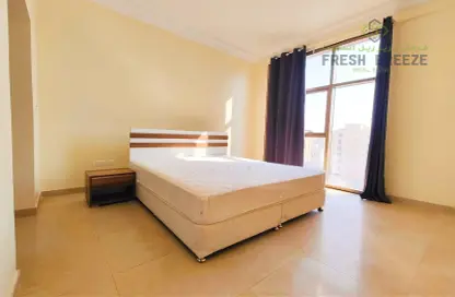 Room / Bedroom image for: Apartment - 2 Bedrooms - 3 Bathrooms for rent in Mughalina - Doha, Image 1