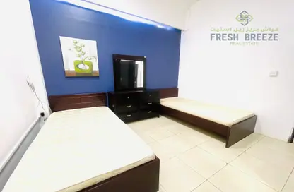 Room / Bedroom image for: Apartment - 1 Bedroom - 1 Bathroom for rent in Abu Hamour - Doha, Image 1