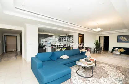 Living / Dining Room image for: Apartment - 2 Bedrooms - 4 Bathrooms for sale in West Porto Drive - Porto Arabia - The Pearl Island - Doha, Image 1