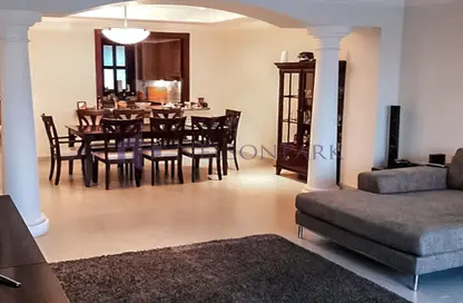 Living / Dining Room image for: Townhouse - 2 Bedrooms - 3 Bathrooms for sale in Marina Gate - Porto Arabia - The Pearl Island - Doha, Image 1
