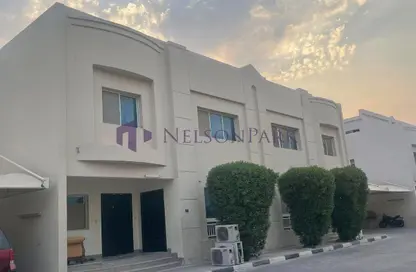 Compound - 6 Bedrooms - 5 Bathrooms for rent in Umm Al Seneem Street - Ain Khaled - Doha