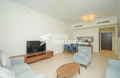 Living / Dining Room image for: Apartment - 2 Bedrooms - 2 Bathrooms for rent in Lusail City - Lusail, Image 1