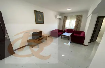 صورة لـ غرفة المعيشة شقة - 2 غرف نوم - 2 حمامات للايجار في نزل سفير بارك ان - نجمة - الدوحة ، صورة رقم 1