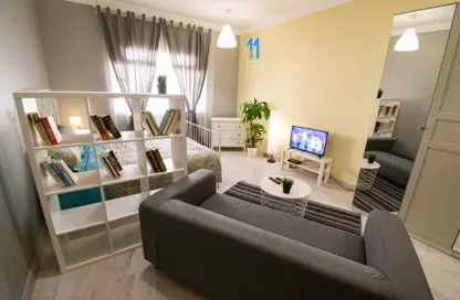 Living Room image for: Apartment - 1 Bathroom for rent in Al Gharrafa - Al Gharrafa - Doha, Image 1