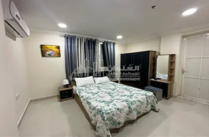 Room / Bedroom image for: Apartment - 1 Bathroom for rent in OqbaBin Nafie Steet - Old Airport Road - Doha, Image 1