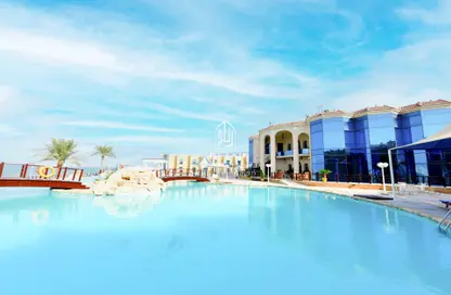 صورة لـ حوض سباحة شقق فندقية - غرفة نوم - 1 حمام للايجار في مجمع الخور - الخور ، صورة رقم 1