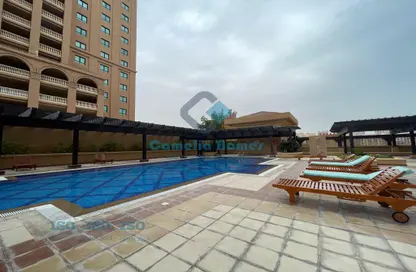 صورة لـ حوض سباحة شقة - غرفة نوم - 2 حمامات للبيع في طريق بورتو الشرقي - بورتو أرابيا - جزيرة اللؤلؤة - الدوحة ، صورة رقم 1