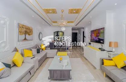 Living Room image for: Apartment - 2 Bedrooms - 3 Bathrooms for sale in West Porto Drive - Porto Arabia - The Pearl Island - Doha, Image 1