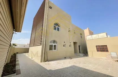 Outdoor Building image for: Villa - 7 Bedrooms for sale in Ain Khalid Gate - Ain Khalid Gate - Ain Khaled - Doha, Image 1