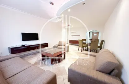 Living / Dining Room image for: Apartment - 2 Bedrooms - 3 Bathrooms for rent in Al Sadd - Al Sadd - Doha, Image 1