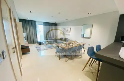 Living / Dining Room image for: Apartment - 1 Bedroom - 2 Bathrooms for sale in Marina District - Lusail, Image 1