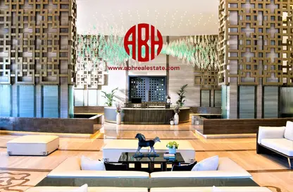 Living Room image for: Apartment - 2 Bedrooms - 3 Bathrooms for rent in Abraj Bay - Abraj Quartiers - The Pearl Island - Doha, Image 1