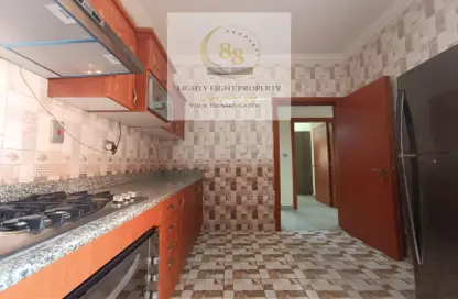 صورة لـ مطبخ شقة - 3 غرف نوم - 3 حمامات للايجار في شارع النصر - النصر - الدوحة ، صورة رقم 1