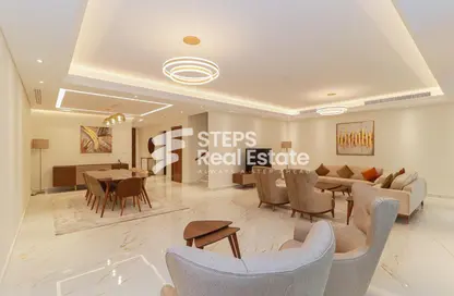 Living / Dining Room image for: Villa - 5 Bedrooms - 6 Bathrooms for rent in West Porto Drive - Porto Arabia - The Pearl Island - Doha, Image 1