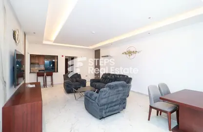 Living / Dining Room image for: Apartment - 2 Bedrooms - 2 Bathrooms for rent in Asim Bin Omar Street - Al Mansoura - Doha, Image 1