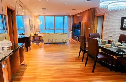 Living / Dining Room image for: Apartment - 2 Bedrooms - 3 Bathrooms for sale in Zig Zag Tower B - Zig Zag Towers - West Bay - Doha, Image 1